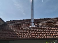 dostatečná výška nad střechou je velmi důležitá pro dobrý tah komína | Nerezový komín v interiéru - Příbram